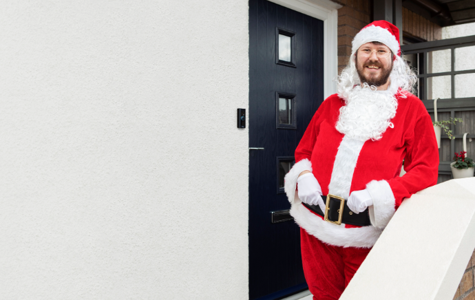 A red suit, white beard, and Ring Protect help make the festive season extra special for this young family.